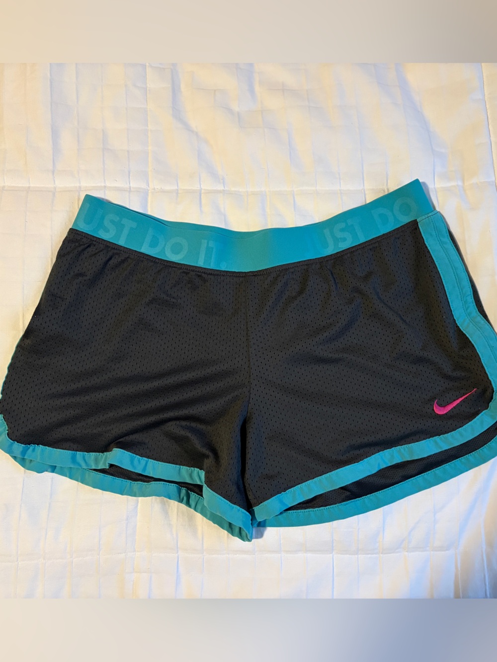 Nike Black Athletic Shorts with Teal Trim and Pink Swoosh